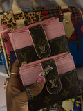 Pink and brown Lv wallet