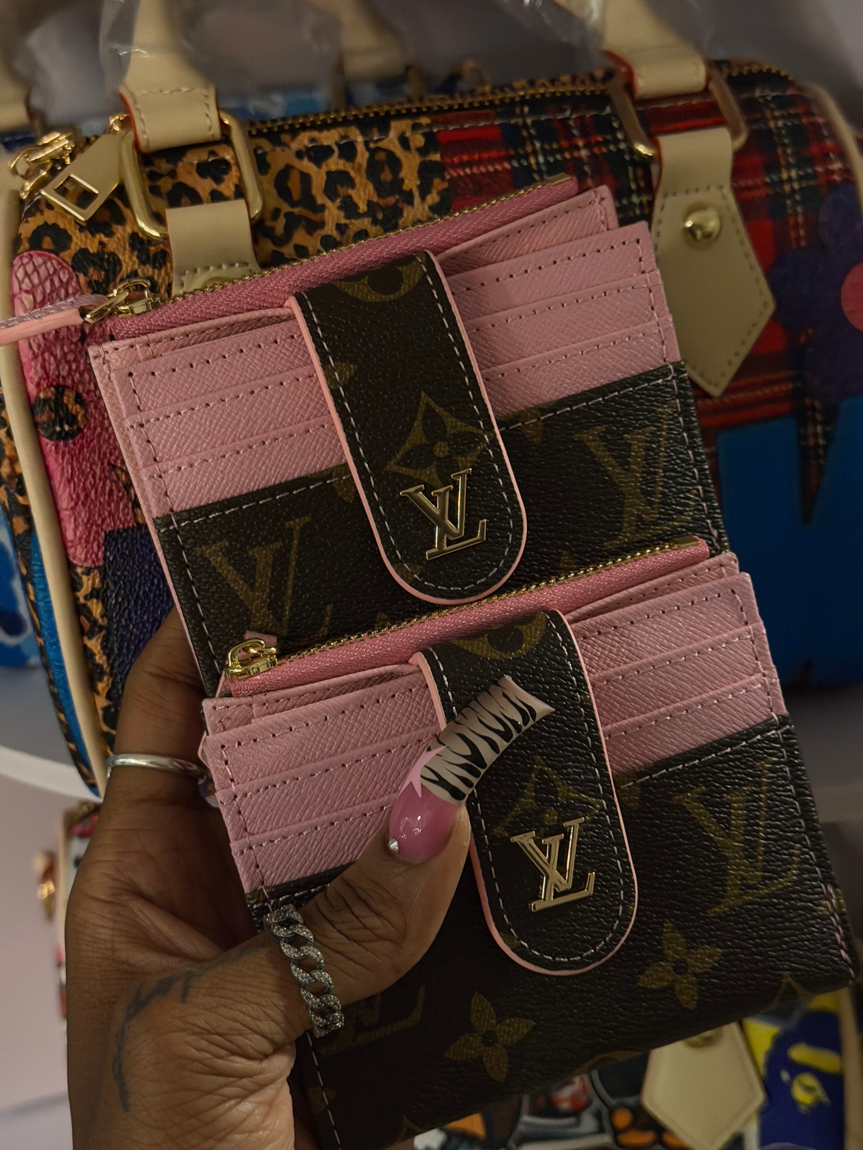 Pink and brown Lv wallet