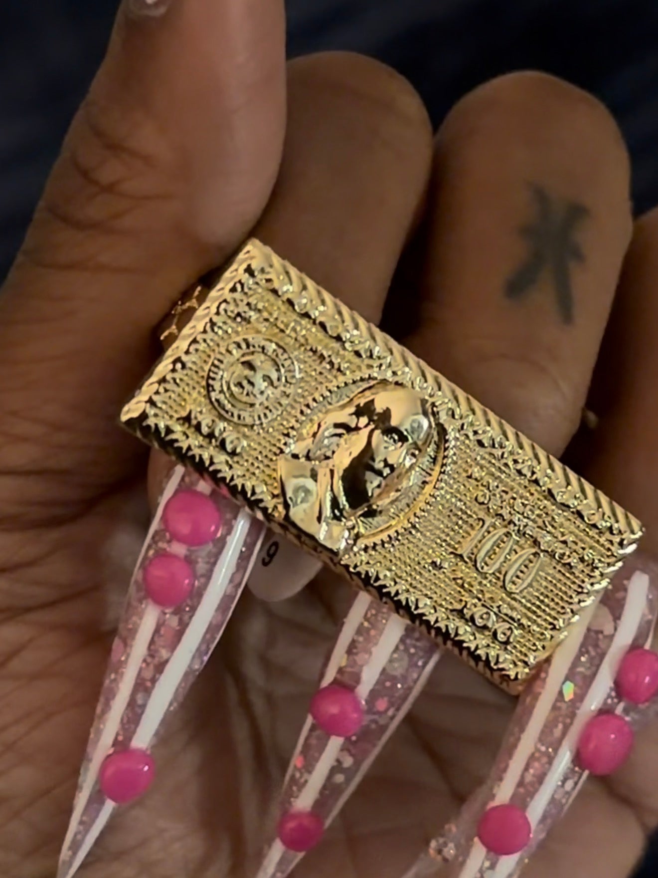 Dollar two finger ring